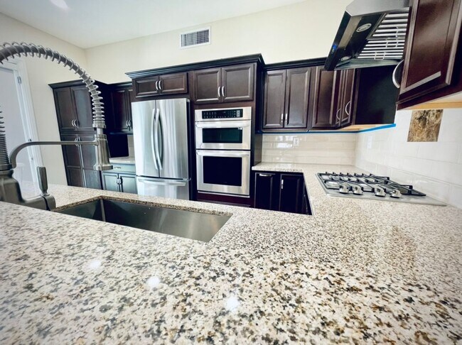 Building Photo - Single-story 4 Bed nestled in the desirable Green Valley Ranch!  3 Car Garage!