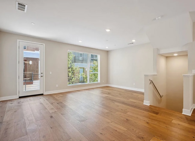 Building Photo - Tucked within the Hollywood Hills in a gated community