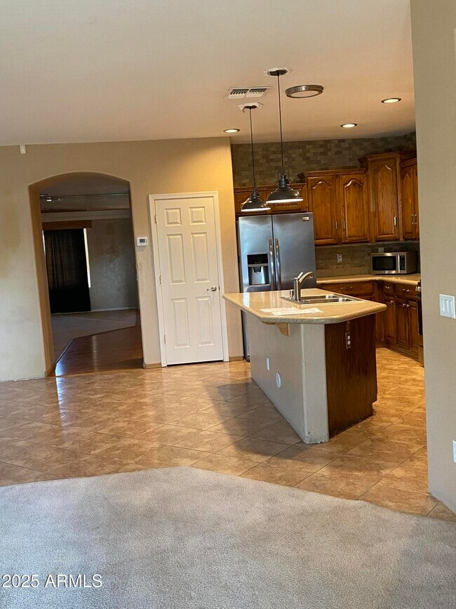 Building Photo - 3376 N 130th Ave