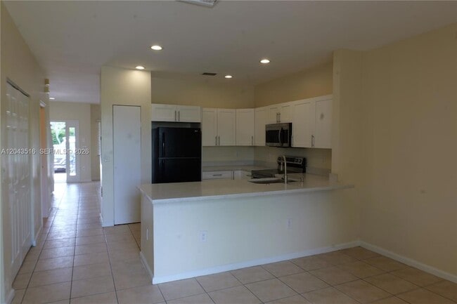 Building Photo - 8220 SW 25th Ct