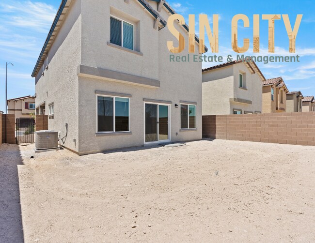 Building Photo - "Charming 4-Bed Home on Love Springs Ln: Spacious 1865 Sq Ft with 2.5 Baths in North Las Vegas!"