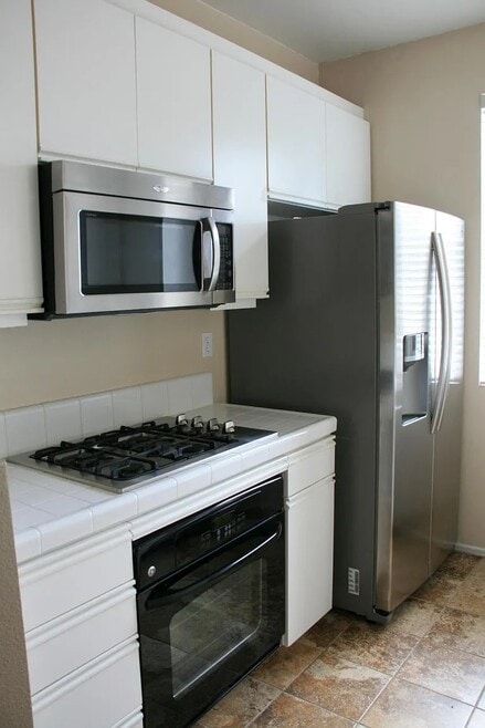 Building Photo - 10830 Sabre Hill Dr #201