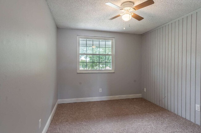 Building Photo - Minutes from UCF | Updated 4BR/3BA Home with Private Fenced Backyard