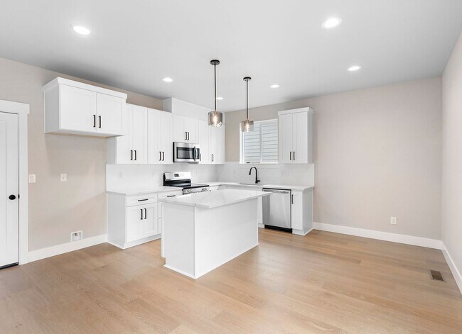Building Photo - Beautiful New Construction 4-Bedroom Home with a Main-Level Bedroom, Designer Finishes, Attached ...