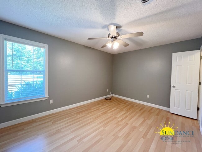 Building Photo - Spacious 3-Bedroom Retreat with New Kitchen Appliances!