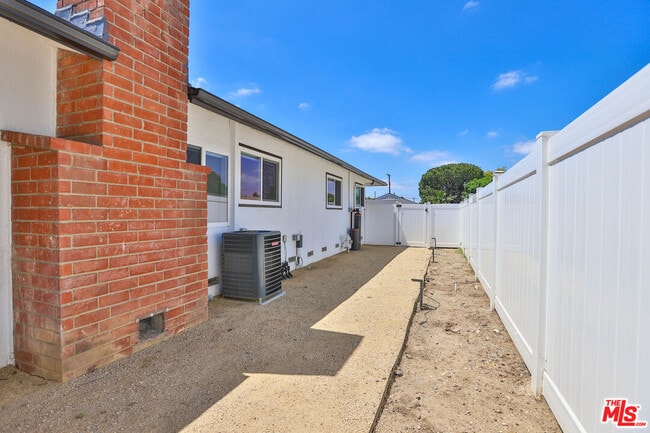 Building Photo - 12831 Red Hill Ave