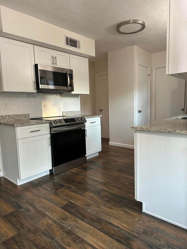 Building Photo - Move-In Ready Corner-Lot Home with Wraparound Porch Near Fort Eisenhower