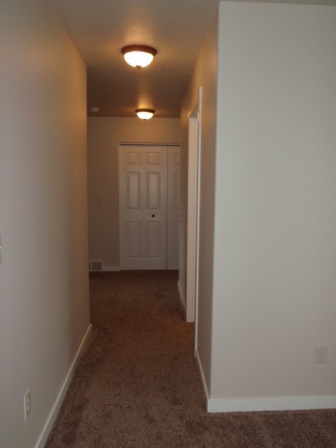 Building Photo - Newer house with attached garage. Half mon...