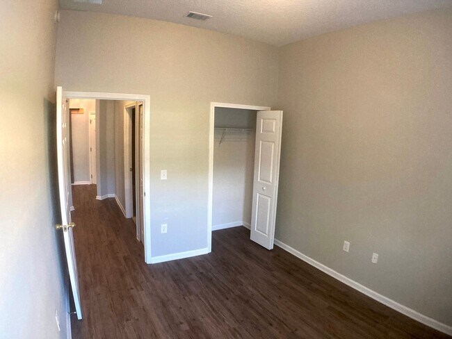 Building Photo - Spacious 3-Bedroom Condo with Pond Views &...
