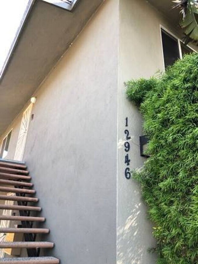 staircase to apartment - 12946 Walsh Ave
