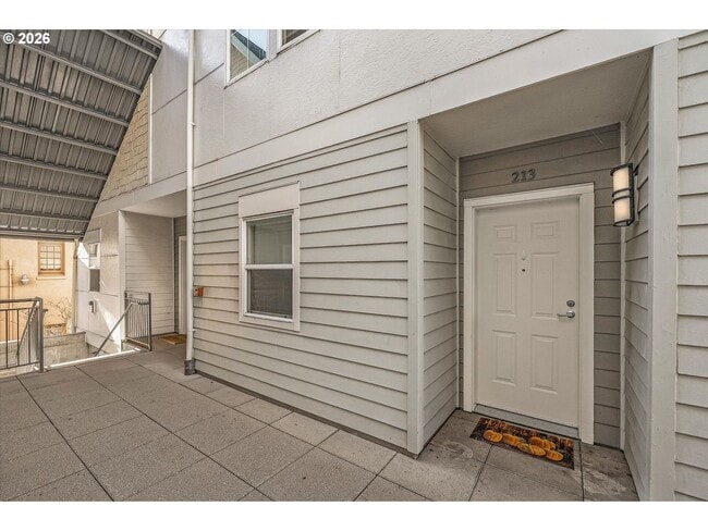 Building Photo - Main Street Living with Granite Kitchen, Gas Fireplace, and MAX Line Access