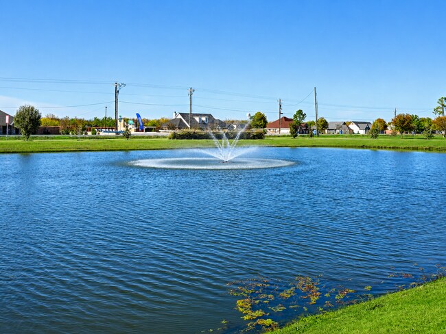 Building Photo - Practically New Home with Parks, Pools, Amazing Community!