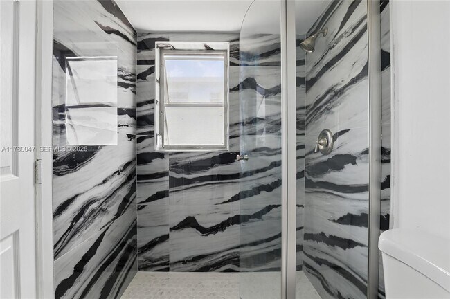 Building Photo - 8540 N Sherman Cir