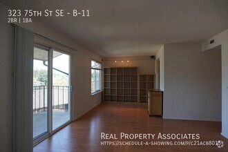 Building Photo - Spacious and Bright 2 Bedroom Condo with L...