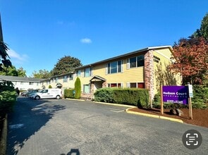 Building Photo - **$750 DEPOSIT & FREE FIRST MONTH'S RENT** Hudson Court - Spacious Main Floor Unit~ Great Natural...