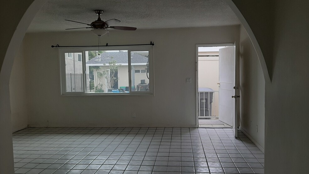 Living room window with view of back of front house - 455 W Elk Ave