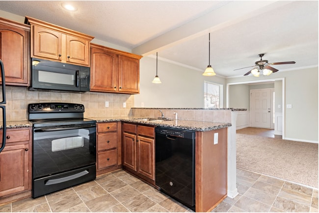 Building Photo - Spacious Two Bedroom Townhome - Available end of February