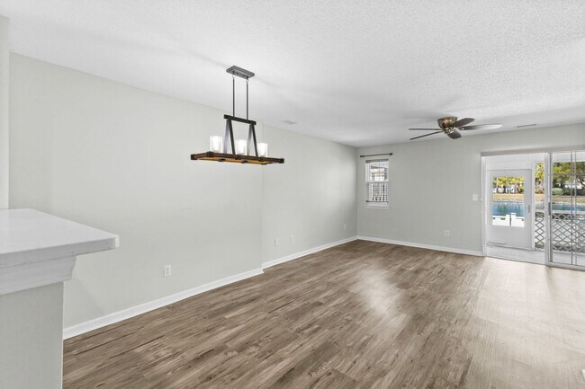 Building Photo - Charming Townhome with Water Views near The Market Common!