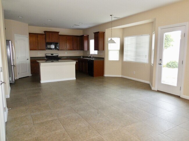 Building Photo - Spacious House w/Tons of Storage,Tile & Wo...