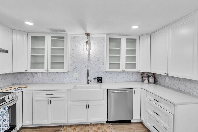 Building Photo - A spacious 3-bedroom, 2-bath layout provides plenty of room for family and guests!