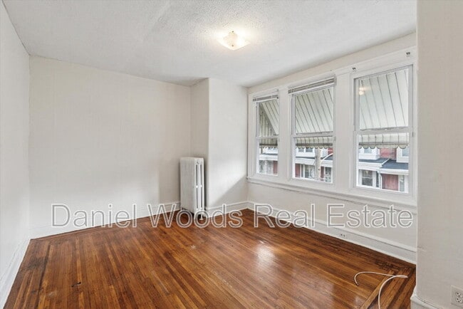 Building Photo - 6227 Addison St