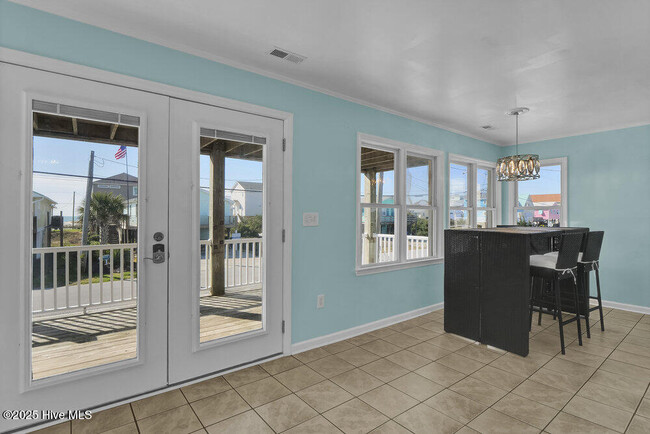 Building Photo - 1207 N Topsail Dr