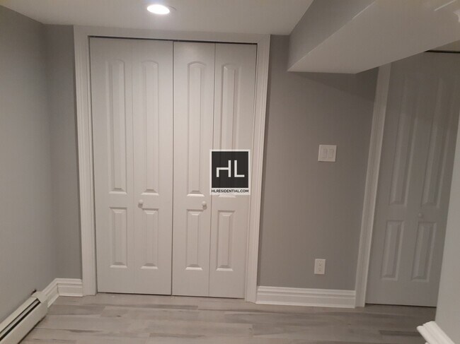 Building Photo - Renovated basement studio in Jamaica Queens