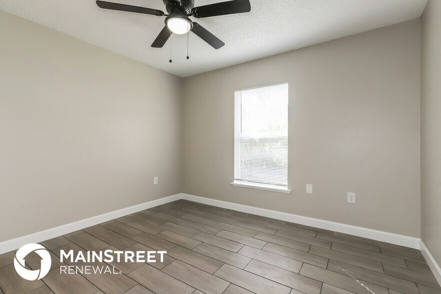Building Photo - 3850 Sleepy Hill Oaks Loop
