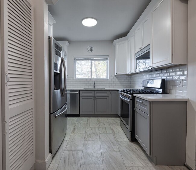 Building Photo - Storybook Tudor New Renovated | Two Full Kitchens | Full Finished Basement