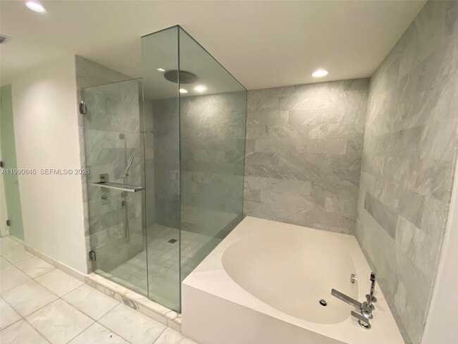 Building Photo - 10203 Collins Ave