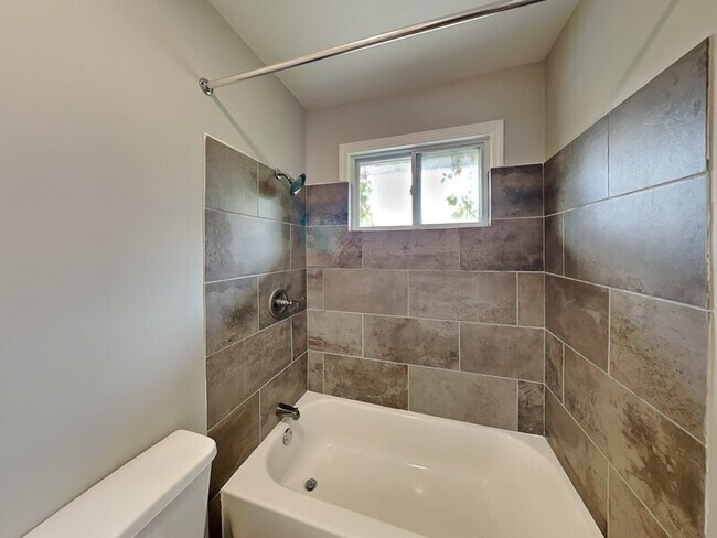 Building Photo - 7745 Madrid Ave