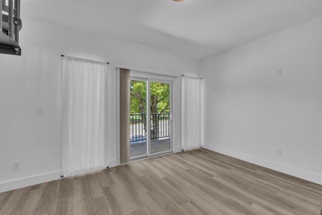 Building Photo - Modern New Construction Townhome with Roof...