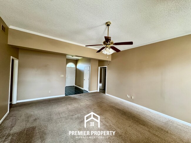 Building Photo - Spacious 3BR/2BA Near Southwind | 1,958 Sq Ft, Brick Fireplace, 2-Car Garage & Quiet Cove