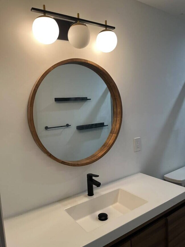 Building Photo - "Executive 2-Bedroom Haven with Gleaming Hardwood Floors in St. Louis City – 3852 Juniata Street!...