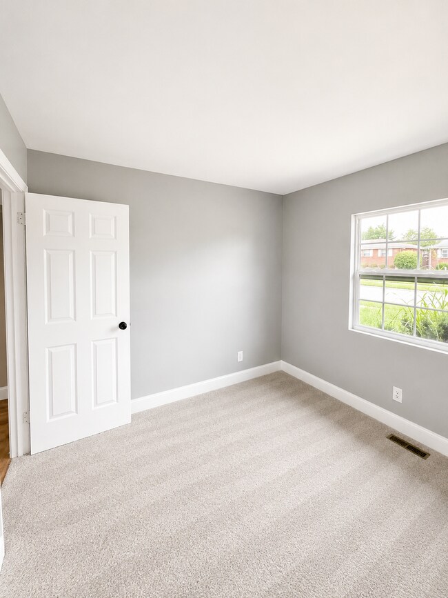Building Photo - Stylishly Renovated 3-Bedroom Home with Finished Basement & Spacious Fenced Yard