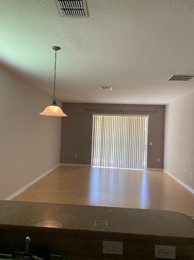 Building Photo - Beautiful 4/2 home in Lovely Venetian Bay Gated Community