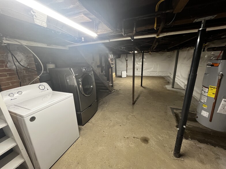 basement laundry with storage - 83 Hayward St
