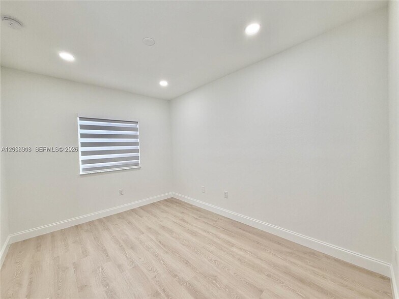 Building Photo - 4412 Woodland Cir