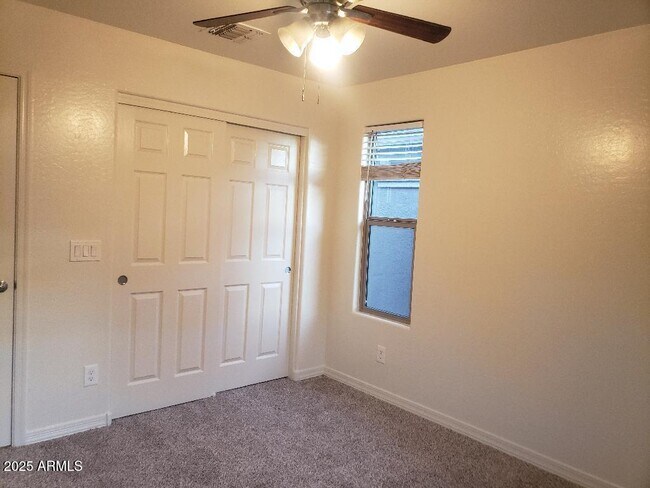 Building Photo - 5750 W Raymond St