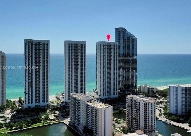 Building Photo - 15811 Collins Ave