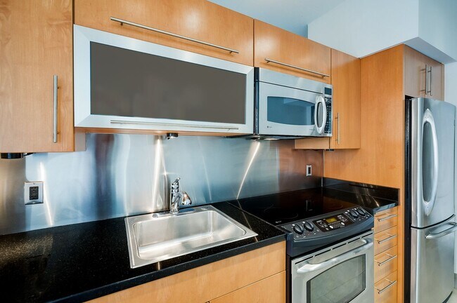 Building Photo - Move-in Ready 1BR 1BA at the Alta is a Min...