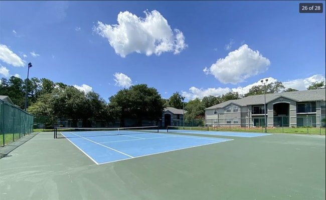 Building Photo - Modern 2-Bed/2-Bath Condo in Gated Communi...