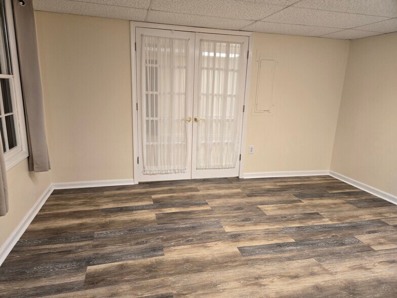 Bedroom w/ French doors - 106 Hickory St