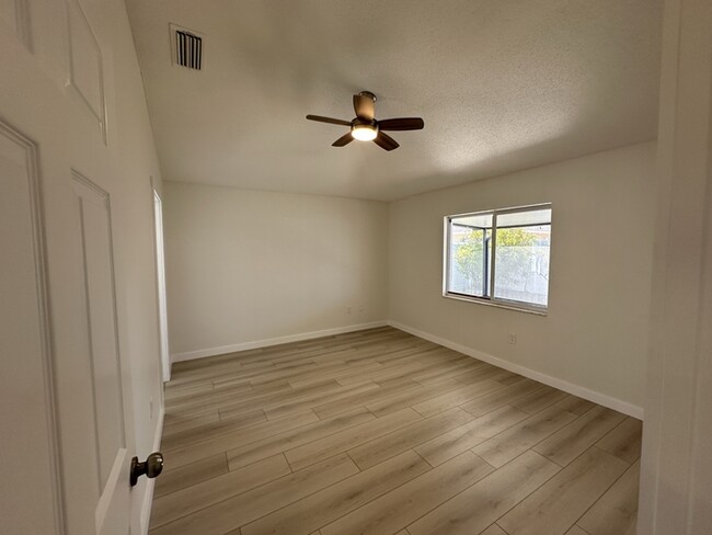 Building Photo - Remodeled 4-bedroom 2 bath 2 car garage in...