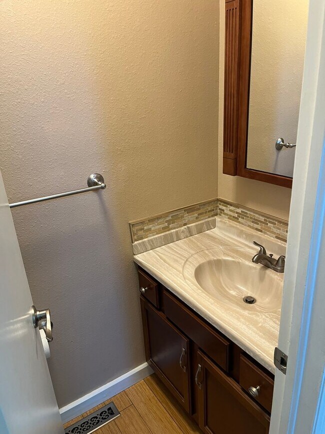 Building Photo - 4 Bedroom Gardener's Delight With Rooftop Patio, Privacy and Covered Parking