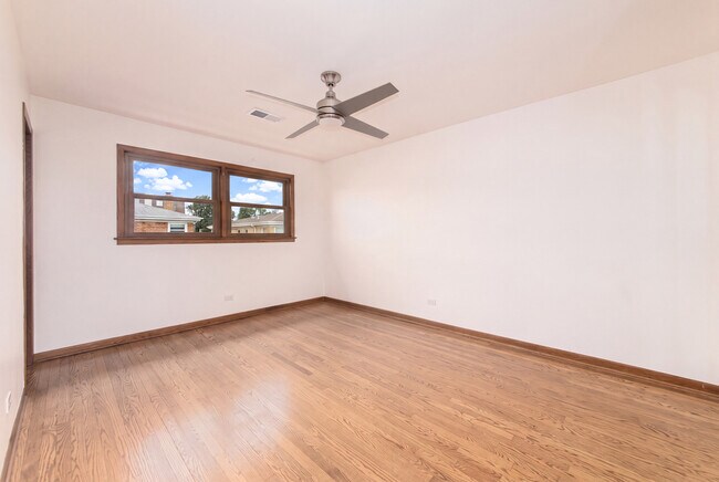Building Photo - 8440 W Windsor Ave