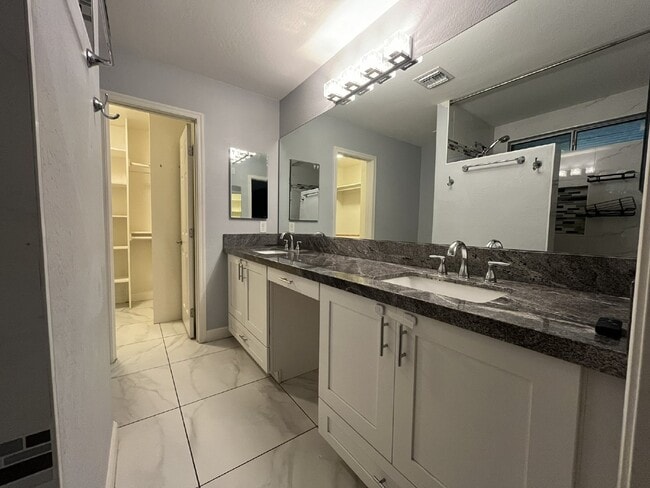 Building Photo - "Charming 4-Bed Oasis with Granite Touch & a Beautiful Pool"