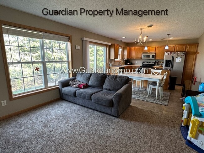 Building Photo - Lakeville End Unit Town Home, 2 Car Garage, 2.5 Baths, Walk out Patio, Available July