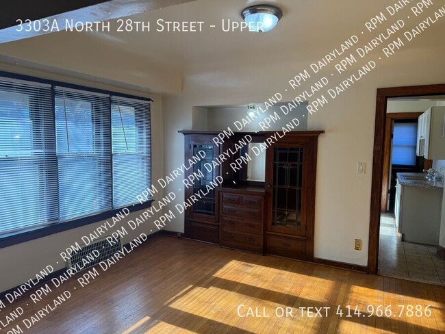 Building Photo - Charming 3-Bedroom, 1-Bathroom Upper Unit ...