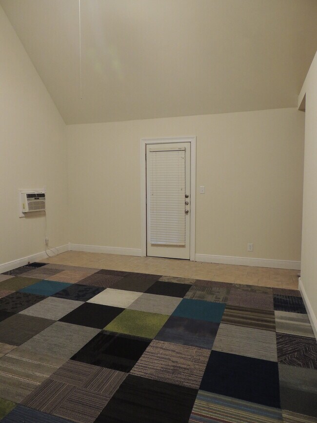 Master bedroom leads to covered deck - 910 Perry Ln